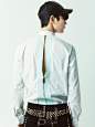 SHINee Minho – Vogue Girl Magazine...men's shirt with zipper detail on the back and black pants with gold stud detail.