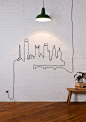 For the times that you can't hide cords, make wall art out of it! LOVE this idea. It's quirky.