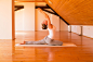 Woman practicing Yoga in a Studio by Michael Osterrieder on 500px