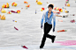 Yuzuru Hanyu of Japan is surrounded by WinniethePooh toys after he competed in the Men's short program during day 2 of the ISU World Figure Skating...