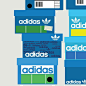 This may contain: several adidas boxes stacked on top of each other with barcodes printed on them
