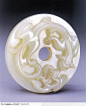 传统工艺品-白色的豹子花纹玉璧