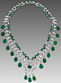 Zambian cabochon emerald necklace by David Morris in white gold.