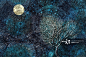 Moonlit winter tree against a starry sky_创意图片