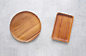 Empty wooden plate on gray cement table background Premium Photo