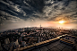General 2500x1649 city cityscape sunset sky clouds rooftops building