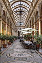 PARIS, FRANCE.  Upscale shopping mall in Paris at the Palais Royal.  This photo was taken on June 30, 2011 by AJ Brustein.