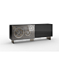 Big ben - Casarredo : Sideboard with wooden structure and 2 sliding doors. External cover in lacquered or etched lacquered glass. Metal legs in brass or titanium finish. 1 door in Mesh glass with gears in mixed brass and titanium finish.