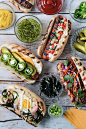 Memorial Day is just around the corner, and we think this festive hot dog party would make a great addition to your long weekend festivities!
