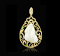 NEPHRITE MONEY TOAD   Carved in white nephrite, the mythical creature Money Toad is believed to bring wealth to the wearer. It represents a popular Feng Shui charm for prosperity.  18K yellow gold carved nephrite pendant Set with diamonds and tsavorite ga
