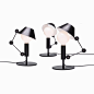 MR. LIGHT SHORT : Table and floor lamp, with floating arm and body in matt black metal. Two-coloured diffuser, with matt white inner part, for a widespread light. Light output in the upper part can be reduced thanks to the hat covering.