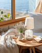 gvnfc_There_is_a_table_near_the_window_with_a_white_tablecloth__44cca9a1-e8a2-452f-9203-b69ac8a25512