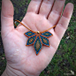 Macrame necklace made with Linhasita 0,5 mm on 1,3 mm goatskin - cornelian color. Colors of thred used: caramel teal olive green old bronze old gold This necklace would look perfect as a set with earrings: