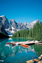 Canoeing surrounded by the Rocky Mountains, Canada.
