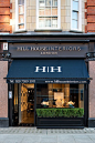 Hill House Interiors. Black storefront awning.  #London  -- love the idea of a long planter across the front to hide less than beautiful storefront in my location.