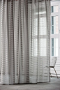 Slice drapery fabric - 100% Trevira CS  Semi-transparent curtain fabric with subtle geometric patterning. Blocks with downward running diagonal cross stripes optically achieve with partial overlapping a moiré effect. The burn out looks like a paper-cut ou