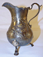 Edith Fennell Hallmarked Silver Cream Pitcher

描述：9.355 ozt. 6" tall. Marked on bottom.