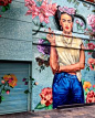 Street art interpretation of a modern Frida Kahlo in Buenos Aires