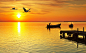 夕阳下的渔船美丽风景高清摄影图片