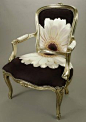 Beautiful chair in black fabric with white flower, lovely idea.