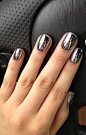 High shine silver metallic nails.