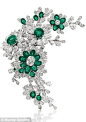 Bvlgari / Elizabeth Taylor Estate - an emerald and diamond flower brooch, by Bulgari. Sold at auction in December 2011 for $1,538,500.