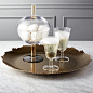 Dojo Round Platter : Shop Dojo Round Platter.   Rough-hewn platter serves organic style edged in elegance.  Handmade of iron with golden snakeskin finish, raw rim raises the bar to deliver drinks, snacks or corral accessories. 