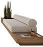 This may contain: a white couch sitting on top of a wooden table next to a potted plant