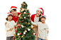 摄图网_507512773_圣诞节幸福一家人装饰圣诞树（企业商用）