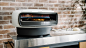 This 2-burner pizza oven cooks a 16" pizza in as few as 2 minutes