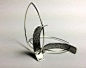 Tension Earrings by Hilary Hachey (Gold & Silver Earrings) | Artful Home : Tension Earrings by Hilary Hachey. The convex earwire combined with the concave element create the tension for which this earring is named. The element is sterling silver, and 
