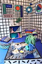 Looking for a striking interior? Put your Memphis inspired art against a wall with graphic wallpaper and choose frames in different colours to make them pop. Choose matching furniture for maximum effect.