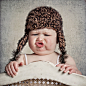 Child photography : This little baby hat a lot of expression during her shoot. Very funny, so I captured this moment that mum put on the hat.... but she did not like it :-)