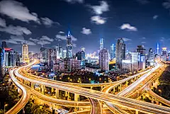 Shanghai Highway at NightCrowds of cars passing a road intersection in downtown Shanghai.