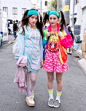 Twintails w/ Headbands, Tiger Backpacks & Colorful Fashion in Harajuku
Harajuku sisters with cute twintails hairstyles, headbands, colorful fashion, and tiger head backpac..