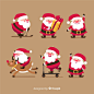 Variety of santa claus postures collection Free Vector
