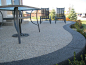 Exposed aggregate - traditional color inset with black #aggregate band. #concrete