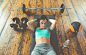 Woman making abs training on the gym floor