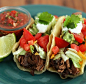 Easy, tender, amazingly delicious slow cooker Shredded Beef Tacos.  This beef can also be used for enchiladas, taquitos or burritos.