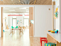 Maple Street School in Brooklyn features warm wood interiors