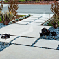 This is an example of a mid-sized modern front yard concrete paver landscaping in San Francisco.