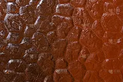 背景-褐色调的波纹玻璃纹理。棕色波纹玻璃，从浅到深的渐变。