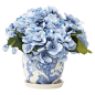 Bring a touch of natural style to your decor with this lovely faux hydrangea arrangement, showcasing vibrant blossoms nestled in a classic ceramic pot.: 