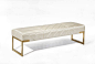 This upholstered Bench from the Lily Jack Regency Collection features quilted upholstery and metal base in a PVD finish.