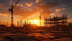 日落建筑施工建筑工地起重机安全生产摄影图
