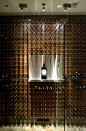 wine wall with custom magnum shelf #DuVino #wine www.vinoduvino.com