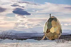 A Mirrored Golden Egg Sauna is Hatched in Sweden : Architects Bigert &amp; Bergstrom recently unveiled Solar Egg, an egg-shaped wood-burning sauna that can seat up to 8 people. The project is part of an urban redevelopment effort lead by developer Riksbyg