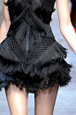 Black dress with structured symmetry, mixed textures & fine fringe trim; fashion details // Dolce & Gabbana