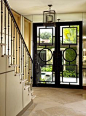 dream entryway Iron metal glass doors and a courtyard