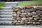 stacked fieldstone retailing wall with granite steps